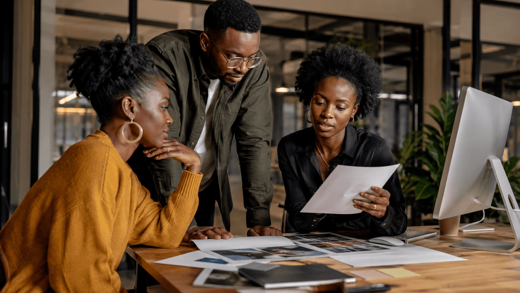 Creative team reviewing campaign work